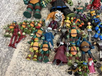 A Variety Of Teenage Mutant Ninja Turtle Figures