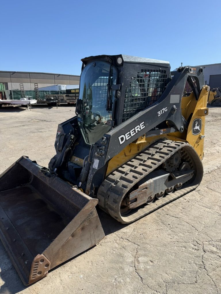 Track Skid Steer for Rent. Enclosed Cab CTL.