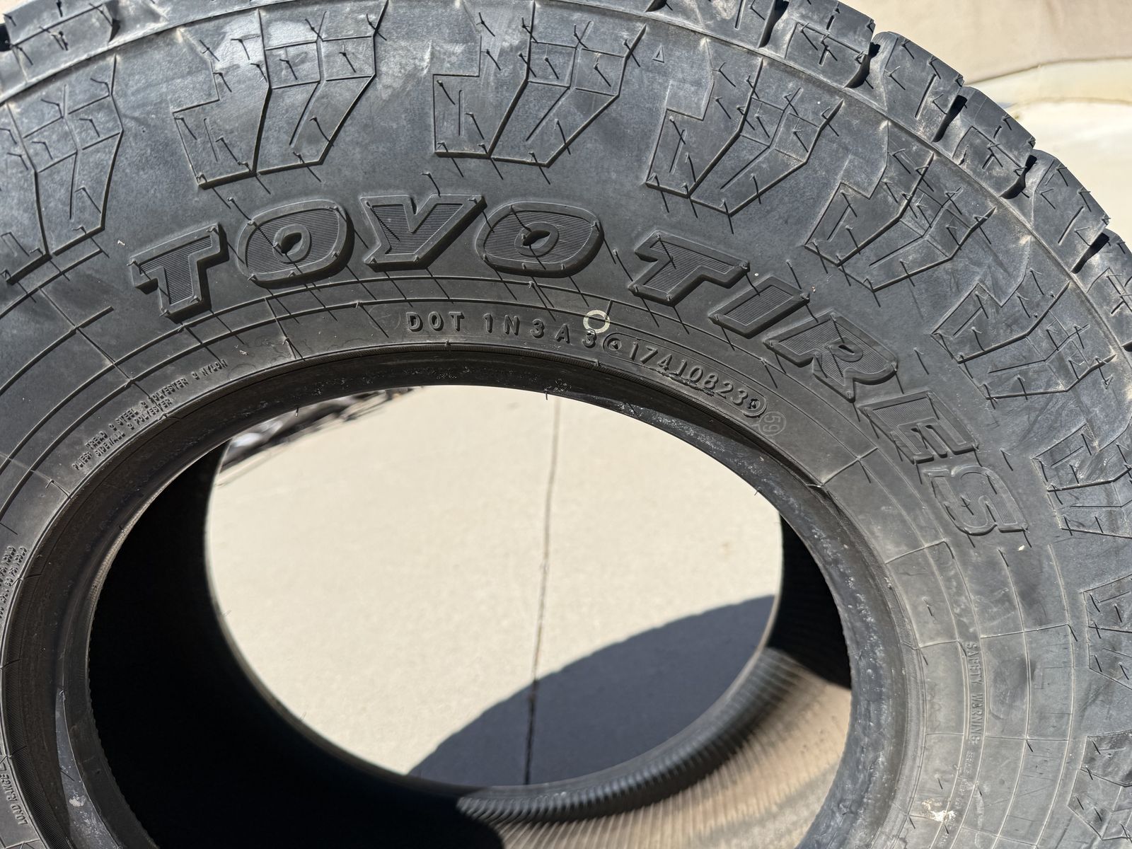 Two LT245/17-R16 light truck tires