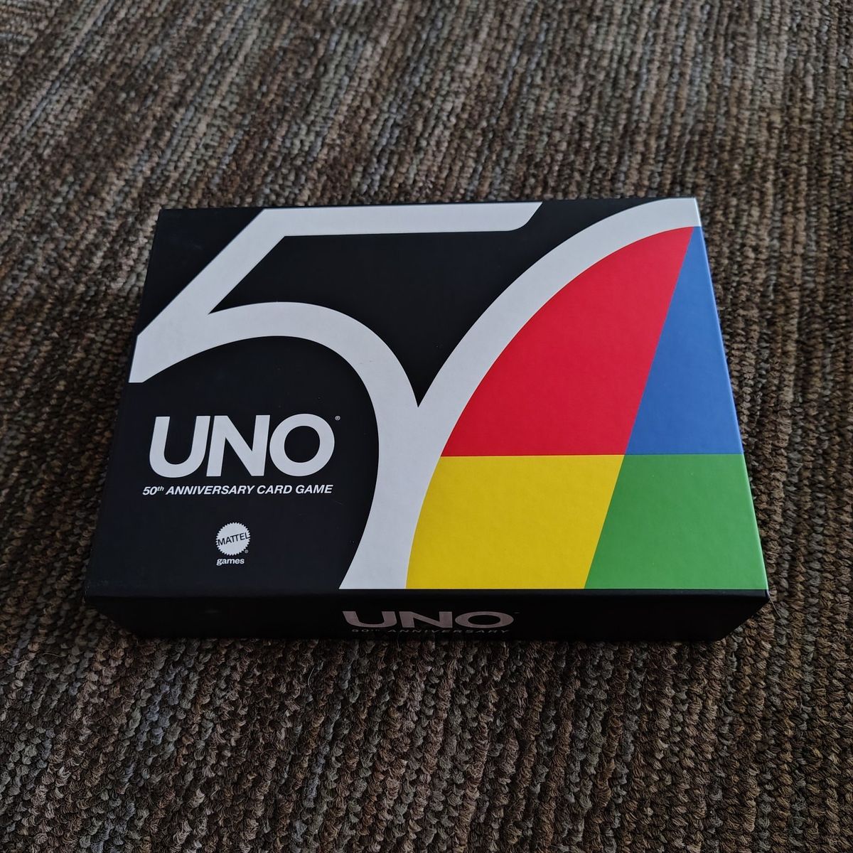 Unopened UNO 50th Anniversary (with Special Coin)
