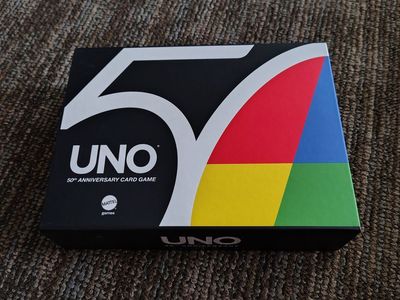 Unopened UNO 50th Anniversary (with Special Coin)