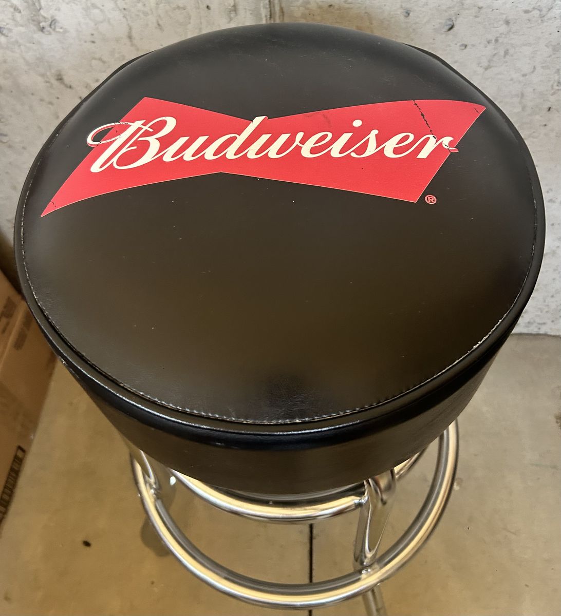 Used Budweiser vinyl and chrome cushion barstool