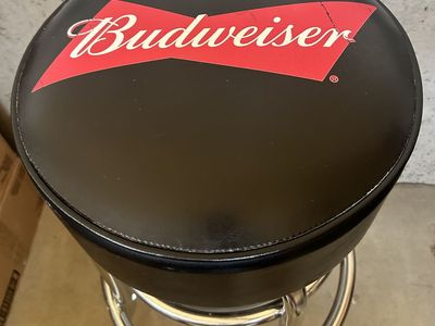 Used Budweiser vinyl and chrome cushion barstool