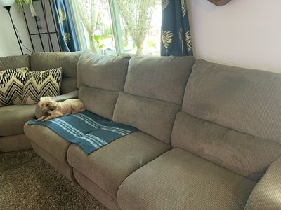 Spacious Brown Reclining Sectional Sofa with Cupholders - Comfort Seating for Your Living Room