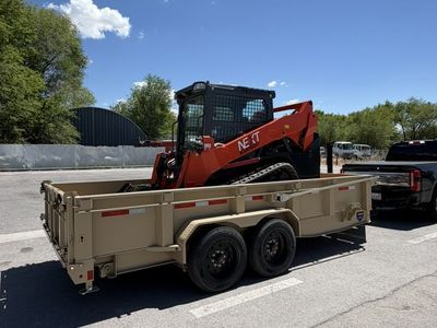 Large Track Skid CTL and Dump Trailer Combo. SVL75-3