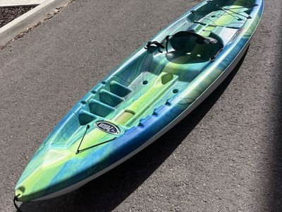 10ft green and blue Pelican Kayak with paddle (2 available/price listed for single Kayak).