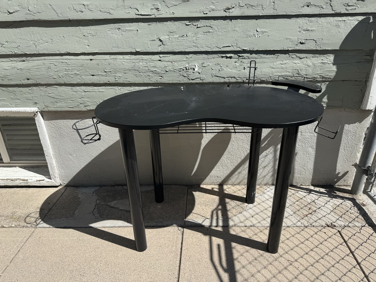 Black Gaming Desk with Cup Holder and Wire Accessories