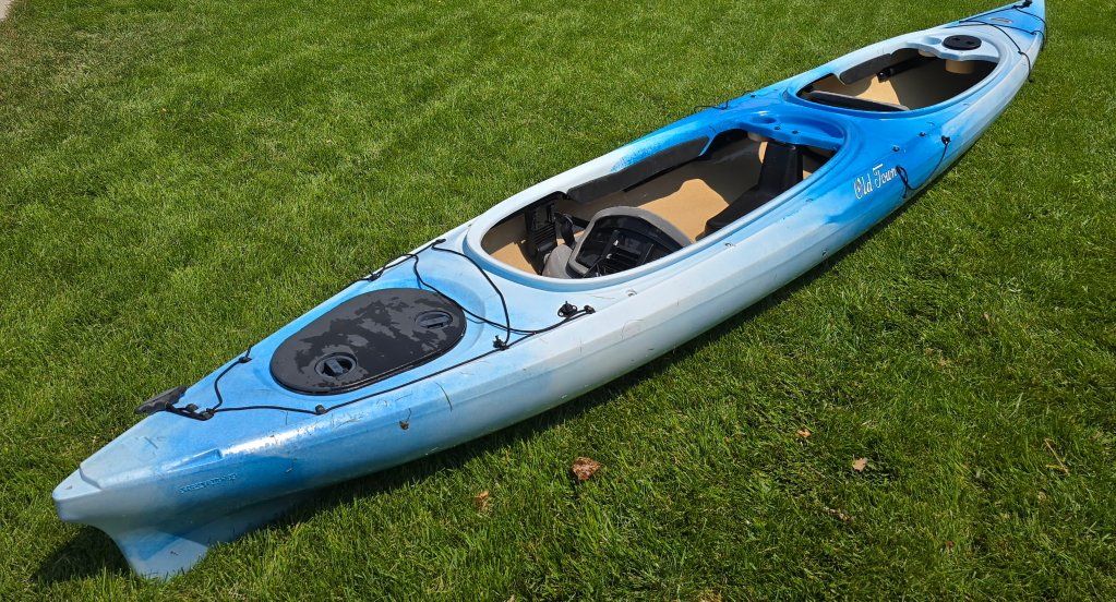 Old Town Tandem inc paddle and vest.