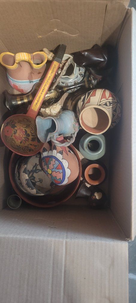 Assorted Collectible Pottery & Vases - Unique Home Decor & Souvenirs. from all over the world. come look if interested.