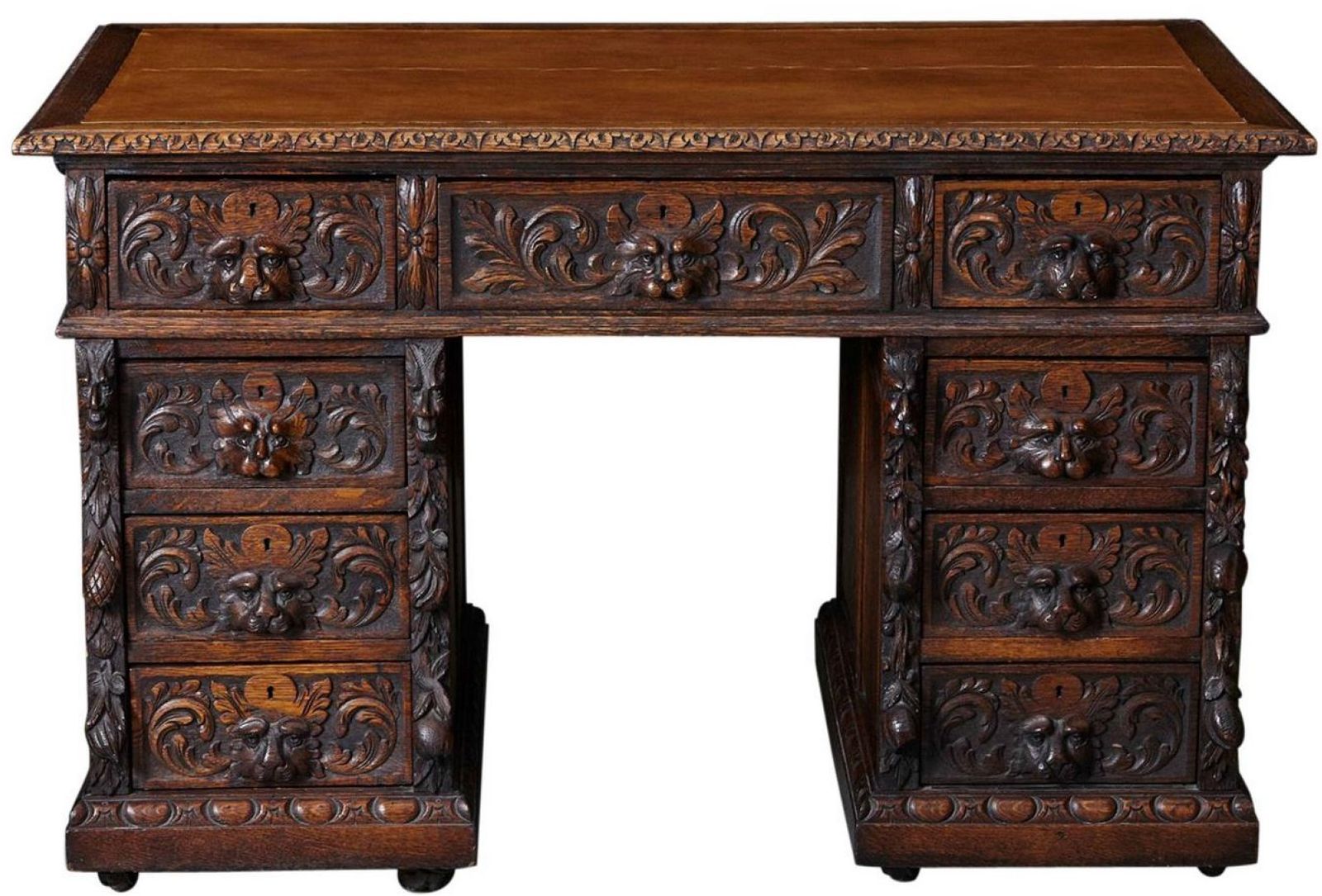 Antique Hand-Carved Oak Desk - Green Man Motif, Ornate Lion Head Pulls, 9-Drawer Executive Style c. 1870
