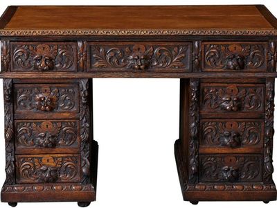 Antique Hand-Carved Oak Desk - Green Man Motif, Ornate Lion Head Pulls, 9-Drawer Executive Style c. 1870