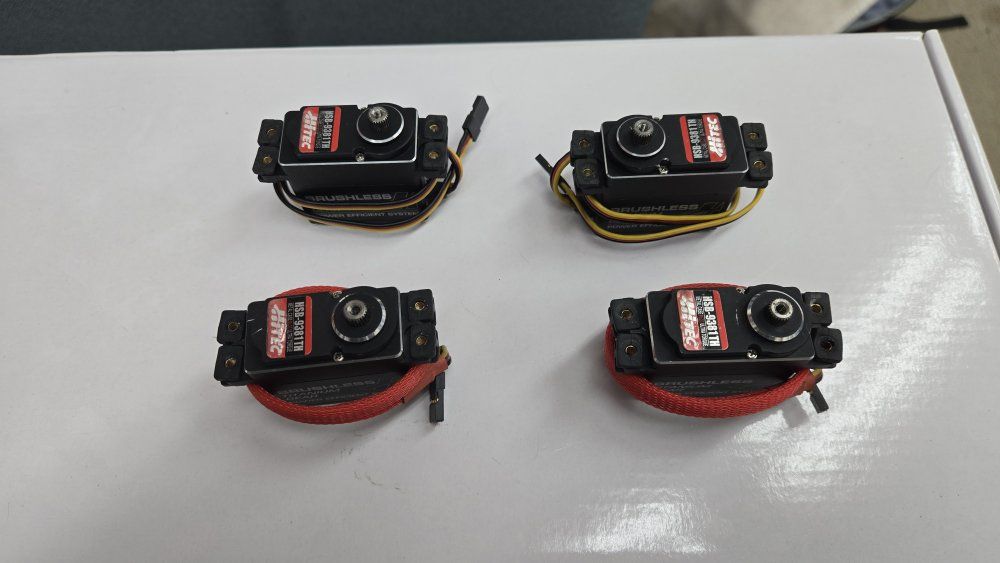 Set of 4 used Hitec HSB-9381TH Brushless Ultra Torque Titanium Gear Servos