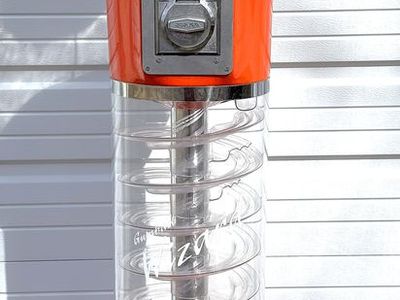 Spiral Wizard Gumball Machine in Striking Orange with a 25 Cent Beaver Coin Mechanism