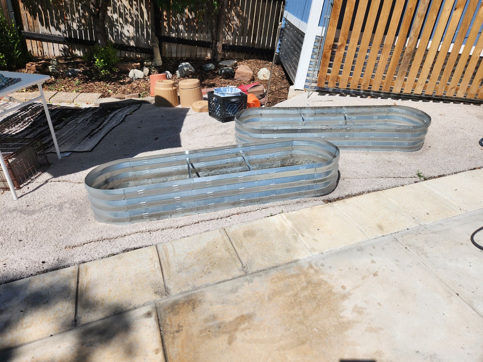Oval steel gardening planter boxes.  10" highx19" wide x 68" long.  Great shape.  Barely used. 