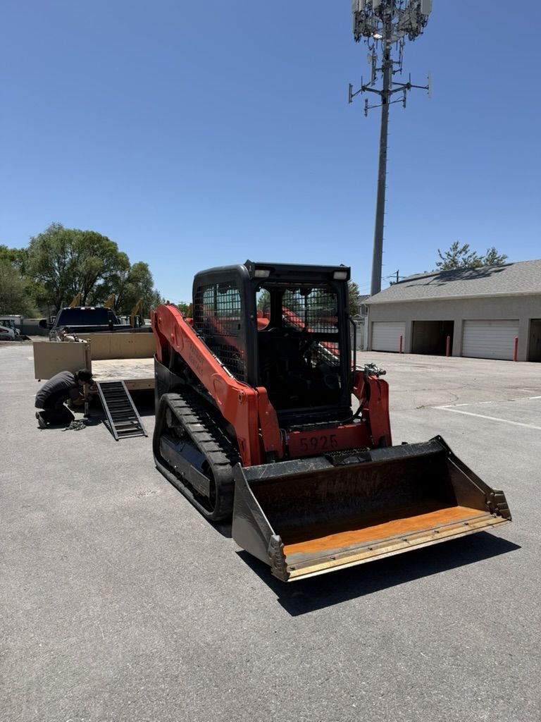 Perfect Dirt Moving Combo. Kubota SVL65 and 7 by 14 Dump Trailer