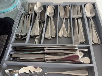 Stainless Steel Flatware Set with Gray Drawer Organizer Tray