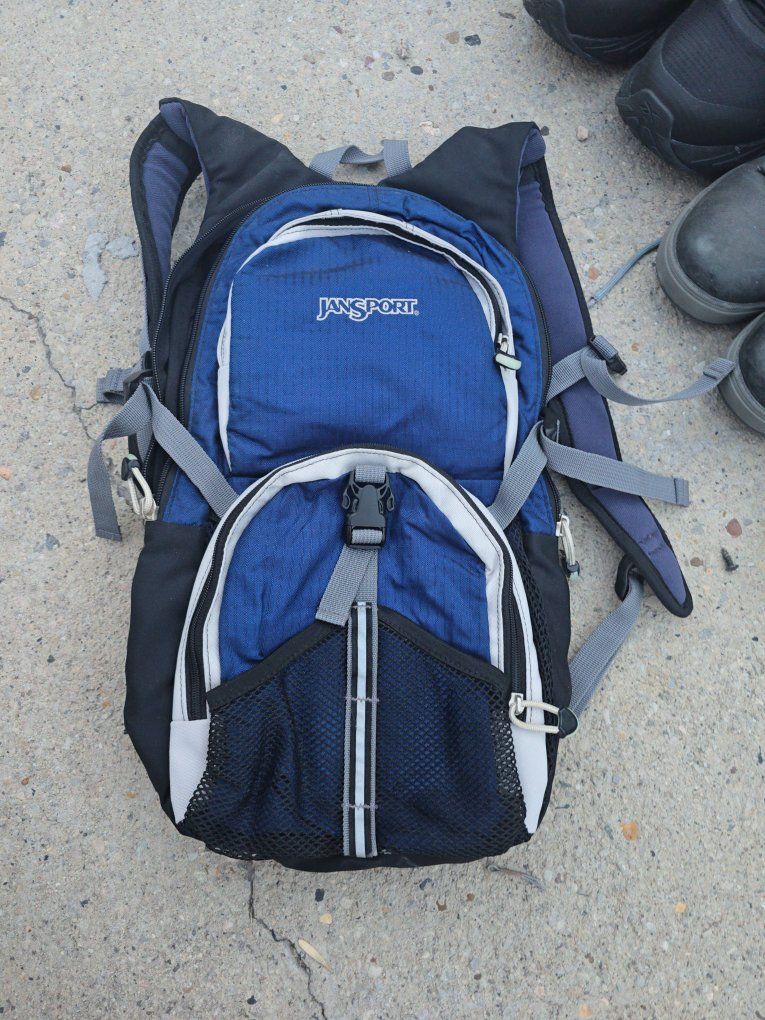 JanSport Blue Backpack with Multiple Pockets