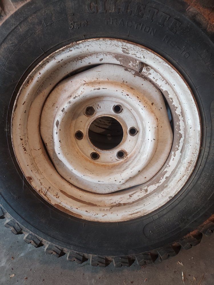 Four 15 inch steel rims