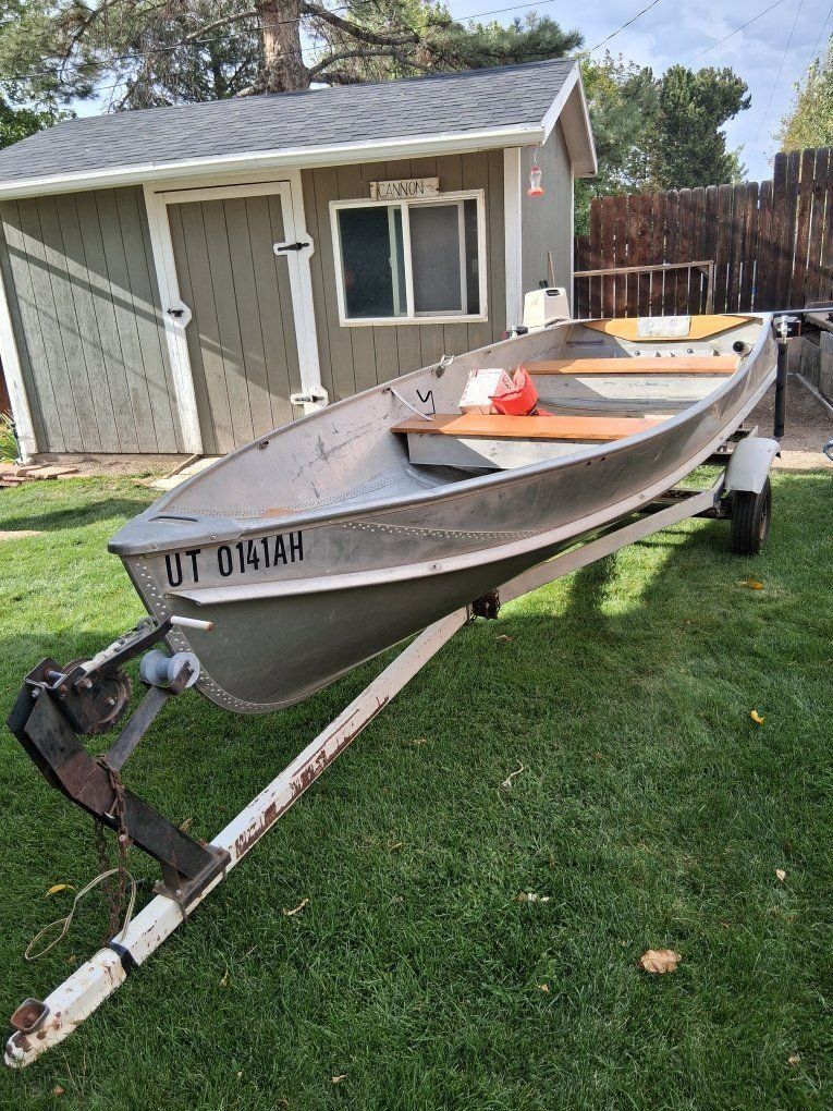 Aluminum Jon Boat with Trailer and Johnson Outboard Motor