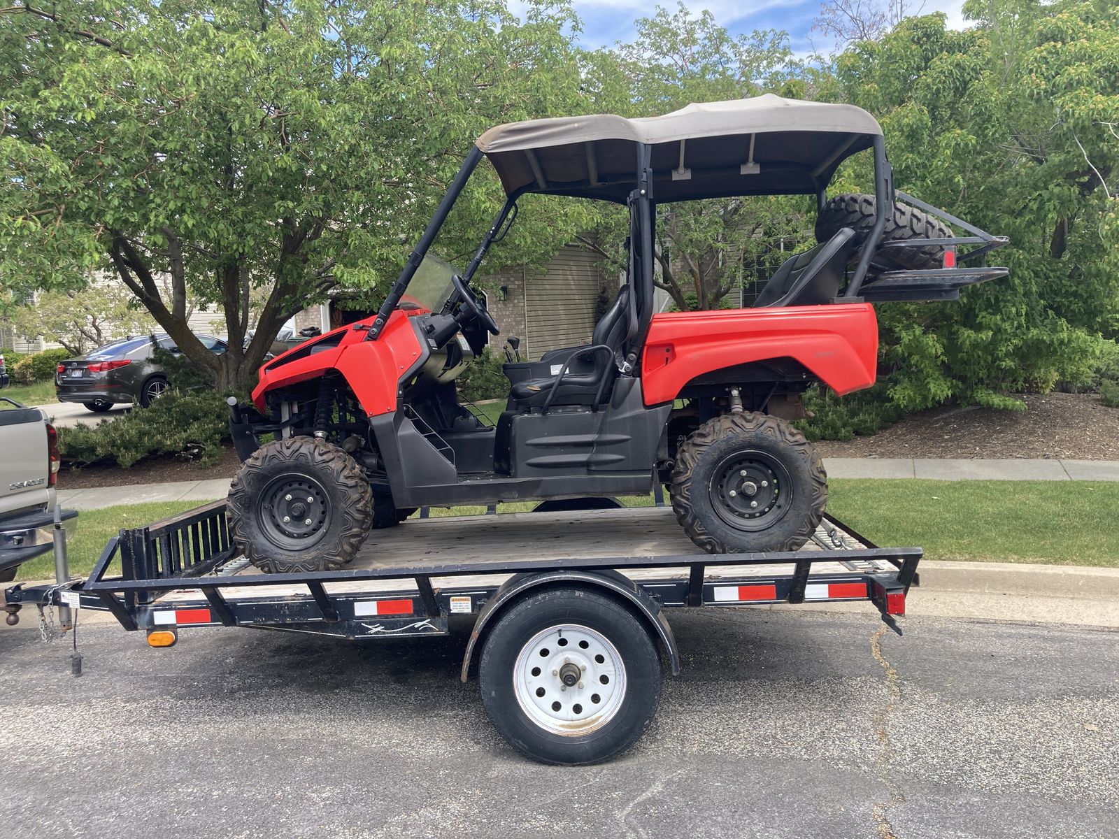 2011 Kawasaki KRF750 Teryx 4-Seater UTV Side-by-Side in Red with Soft Top and Rear Rack
