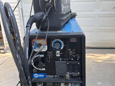 Miller Trailblazer 301 G portable welder and suitcase wire feeder