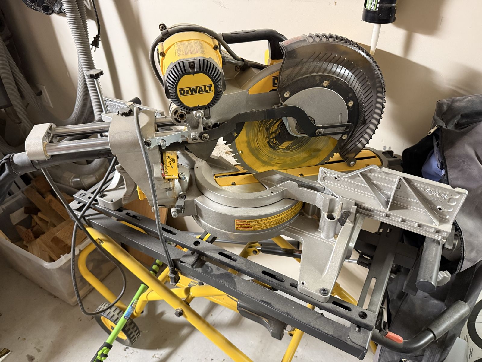 DEWALT DWS779 12" Sliding Compound Miter Saw w/ Rolling Stand - Used. Will sell saw for $300 or $425 with folding table