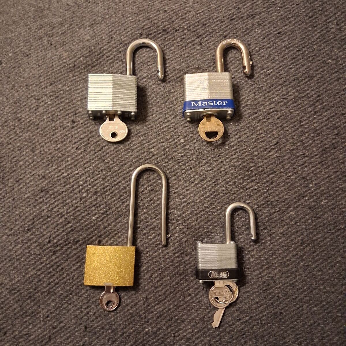 Four Padlocks With Keys