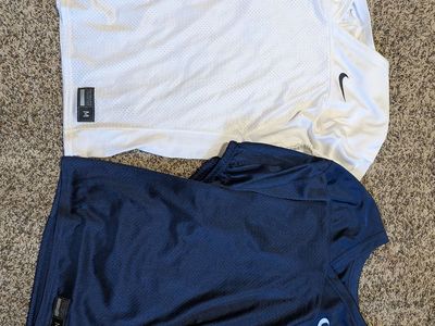 2 Nike medium football practice jerseys