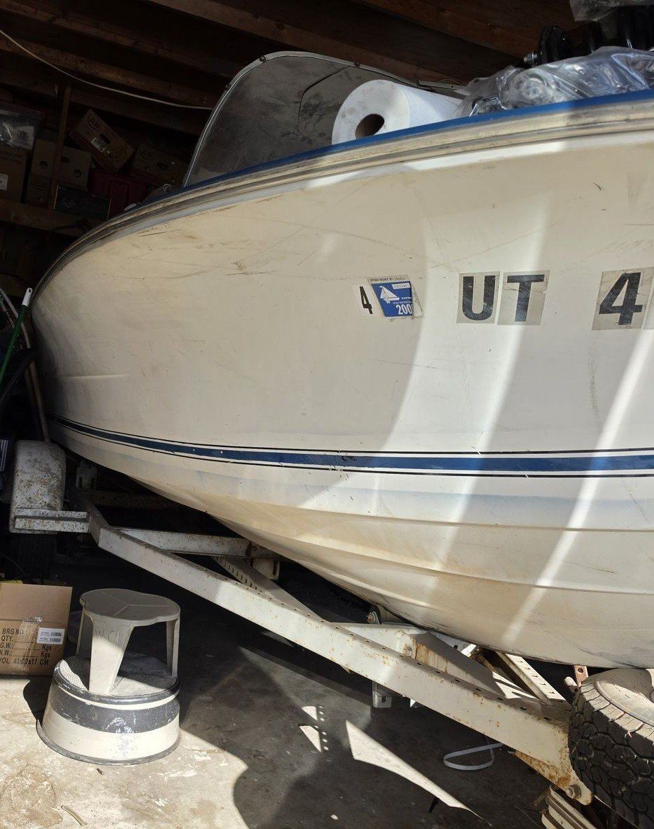 Mercury 402 Outboard Motor with boat