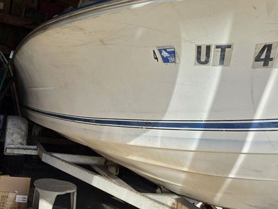 Mercury 402 Outboard Motor with boat