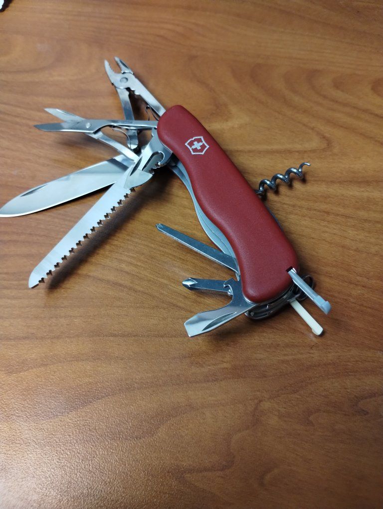 Victorinox Swiss Army Knife Red Multi-Tool with Pliers, Saw, and Corkscrew