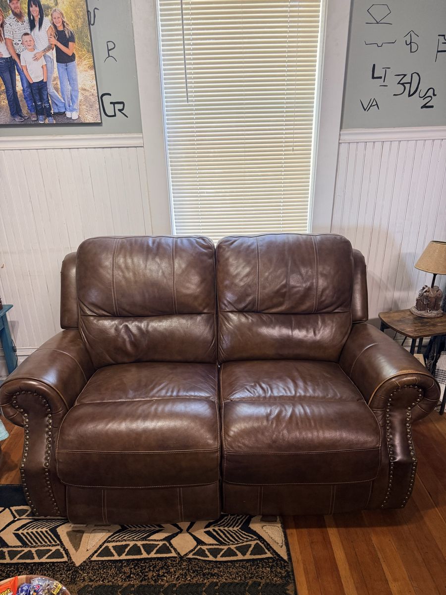 Brown Leather Power Reclining Loveseat - Studded Arms, Plush Seating, USB Ports.