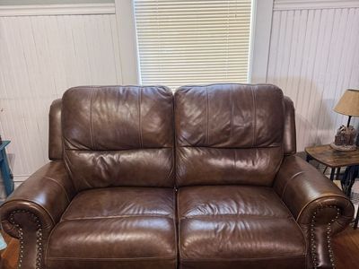 Brown Leather Power Reclining Loveseat - Studded Arms, Plush Seating, USB Ports.