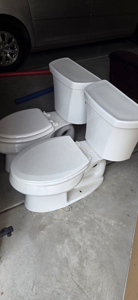Two near new toilets.
