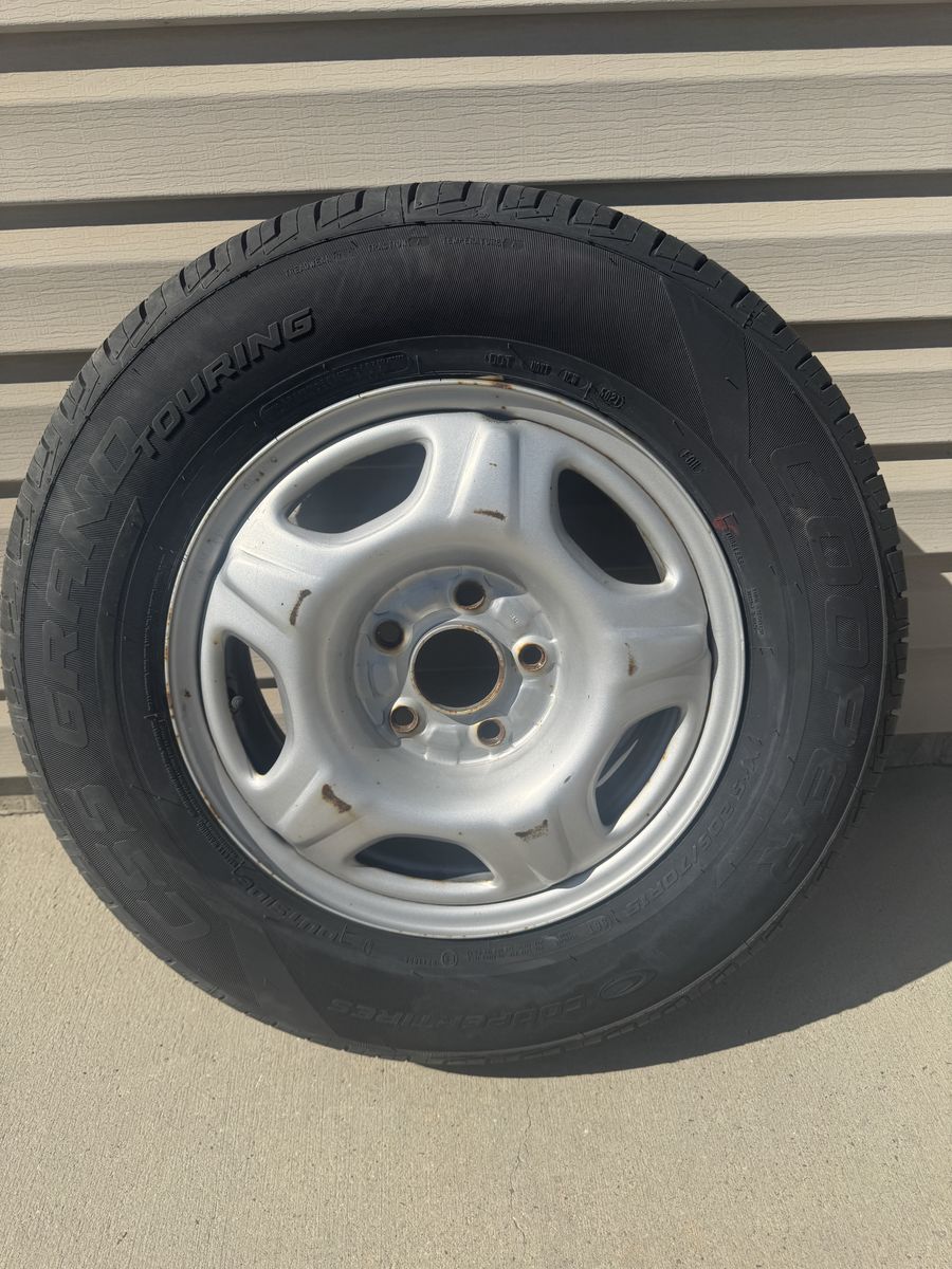 Like new 205/70/15 Tire and Wheel