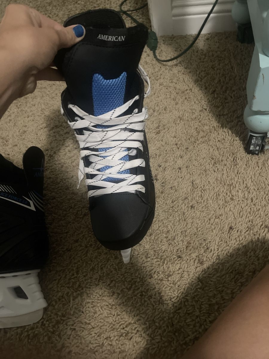 Pair of American Ice Force hockey skates for men. 