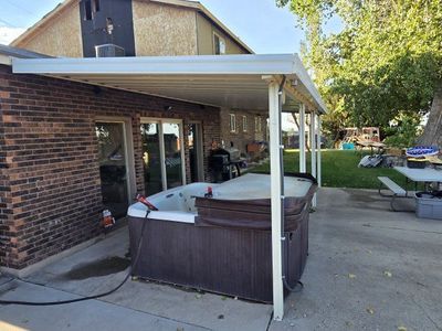23 foot by 11 foot aluminum awning