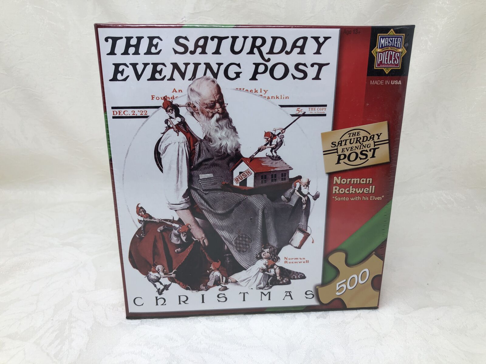 The Saturday Evening Post Christmas Jigsaw Puzzle – “Santa With His Elves” – 500 Pieces