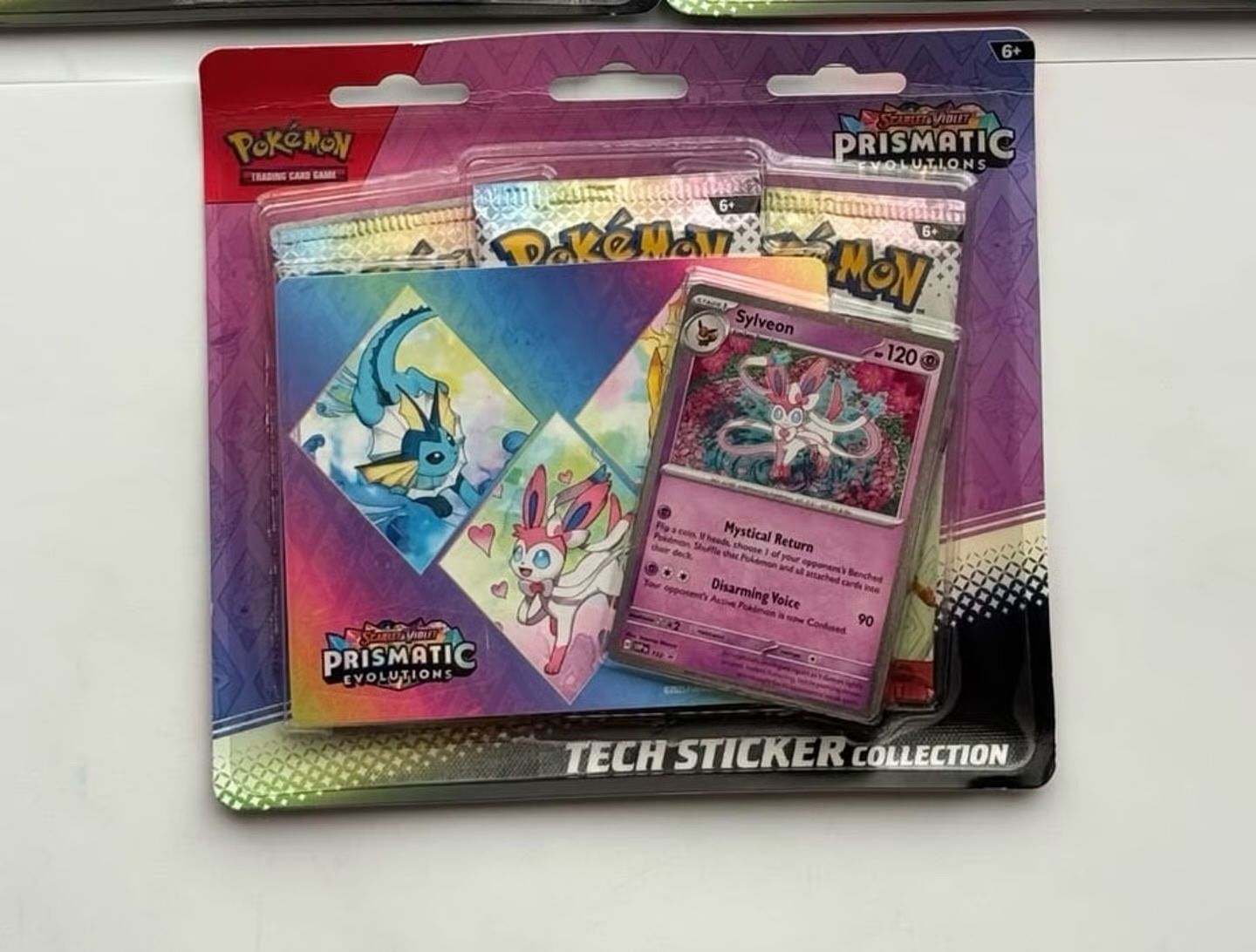Pokemon TCG Prismatic Evolutions Tech Sticker Collection - Sylveon Card & Packs