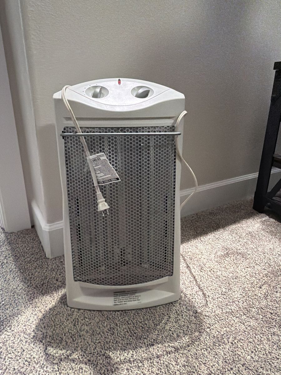 FREE-White Oscillating Space Heater with Adjustable Thermostat and Two Heat Settings
