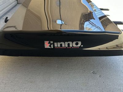 Inno 660 roof box with aero bars and mounts.