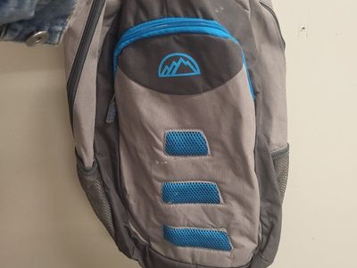 Gray and Blue Backpack with Front Zip Pocket