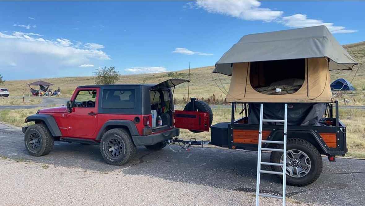 Custom built tent trailer with 2 person ARB roof top tent .
