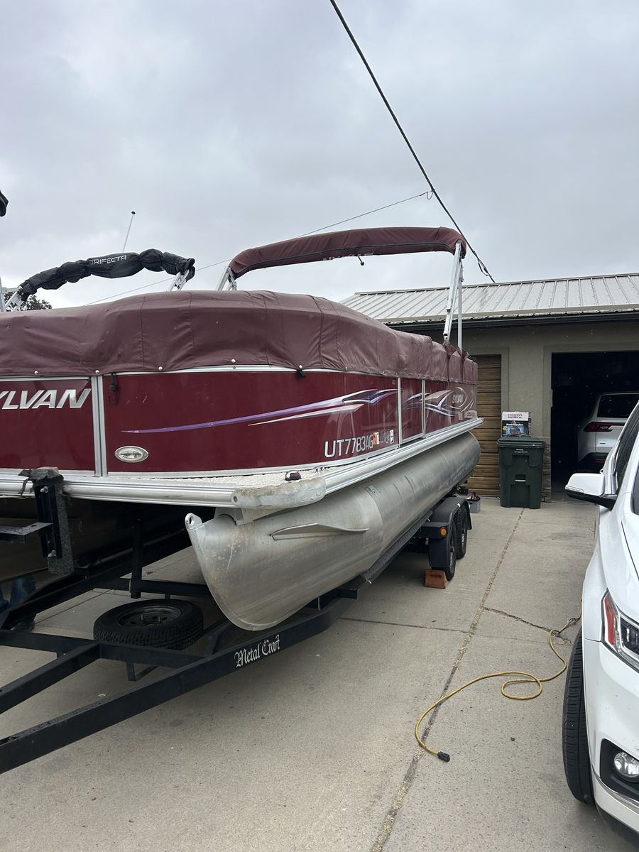 Sylvan Pontoon Boat with Mercury OptiMax 115 HP Outboard Motor - Ready for the Water!