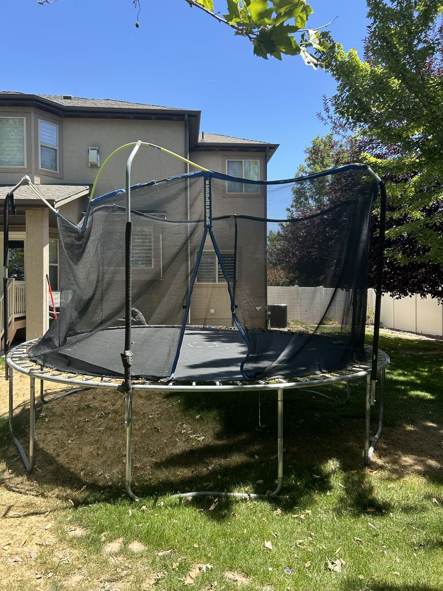 SportsPower Trampoline with Enclosure Net - Used, Great for Outdoor Fun