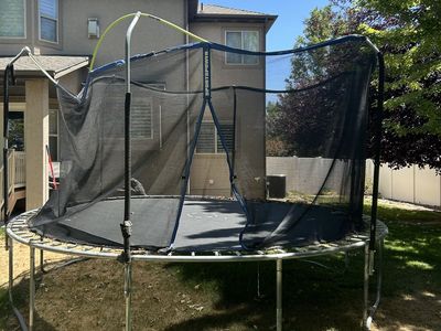 SportsPower Trampoline with Enclosure Net - Used, Great for Outdoor Fun