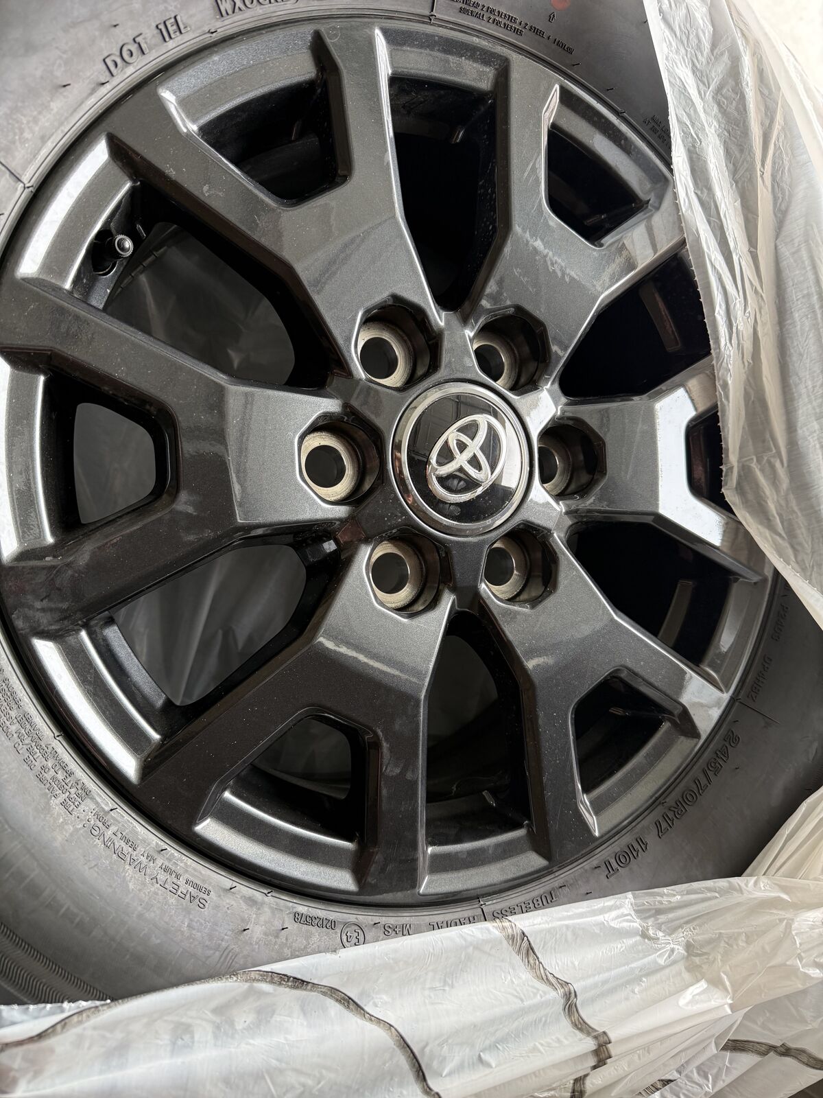 Brand new Tacoma wheels and tire