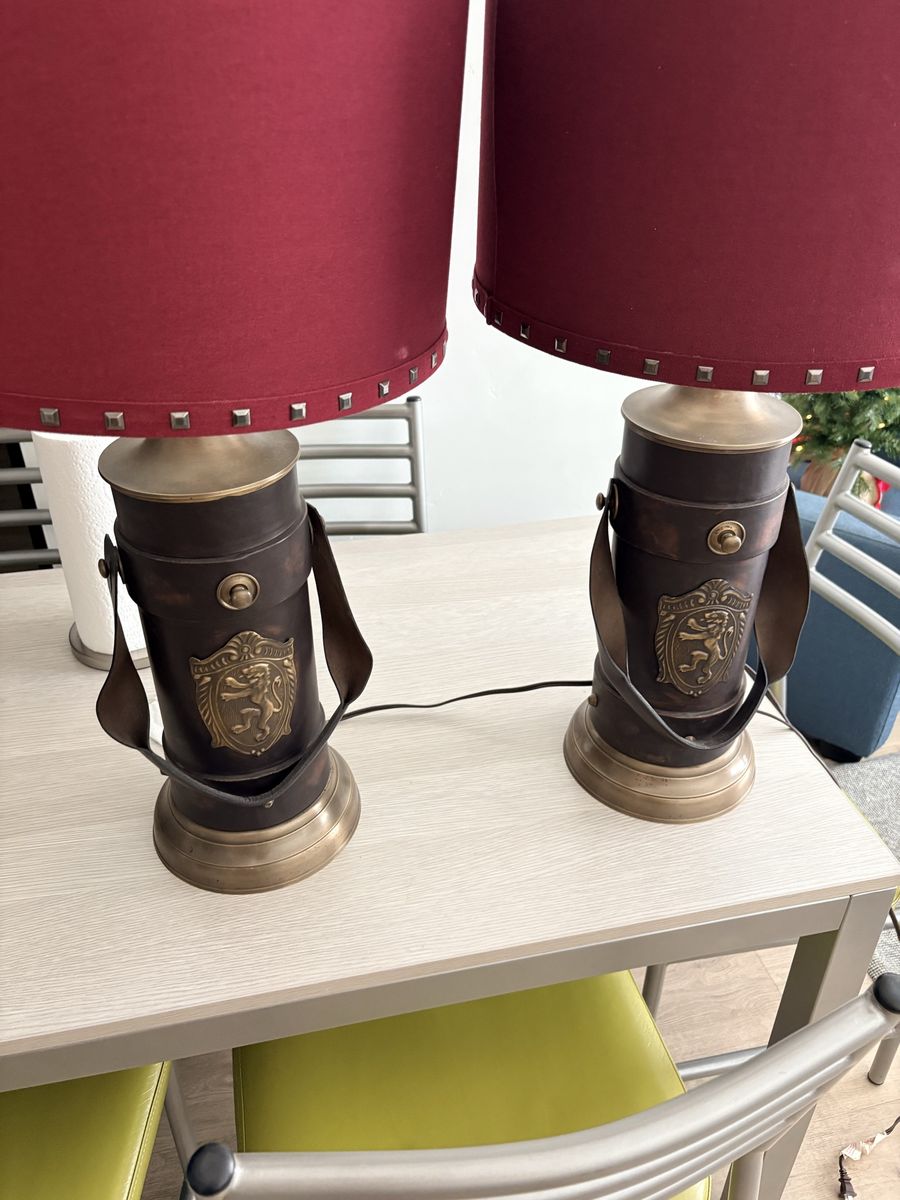 Two Brass and leather lion lamps