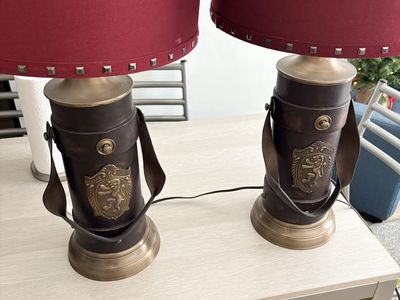 Two Brass and leather lion lamps