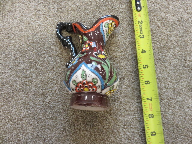 A VERY ELABORATE DECORATIVE MILK OR OIL PITCHER - MADE IN KOTOR, MONTENEGRO